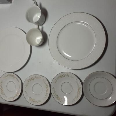 Assorted china plates and cups