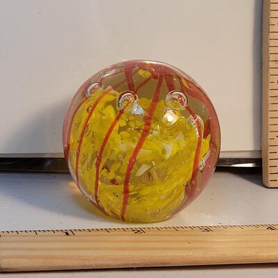 Murano style glass paperweight with bubbles