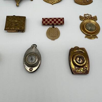Lot of 21 Tom Mix Rings Badges Pins and Pendants from 1940s and 1950s