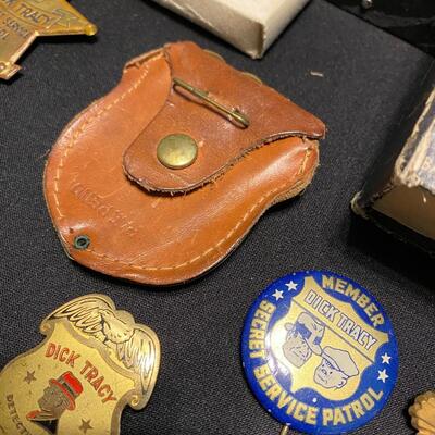 Large Lot of Dick Tracy Collectibles Books Buttons Pins and Badges