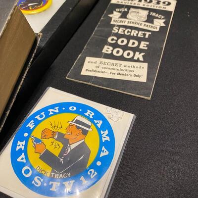 Large Lot of Dick Tracy Collectibles Books Buttons Pins and Badges