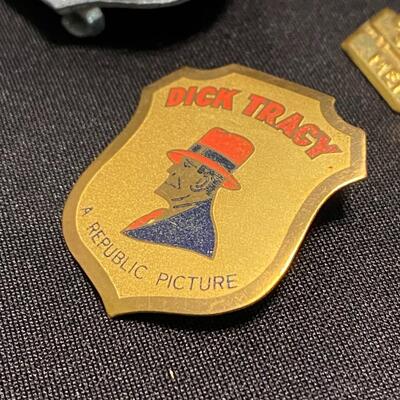 Large Lot of Dick Tracy Collectibles Books Buttons Pins and Badges
