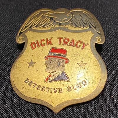 Large Lot of Dick Tracy Collectibles Books Buttons Pins and Badges