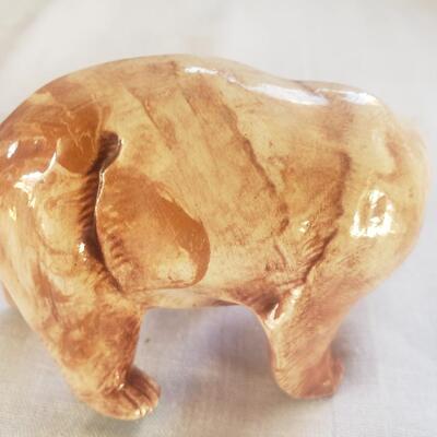 Bear with fish figurine