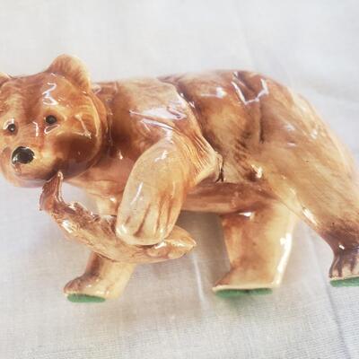 Bear with fish figurine