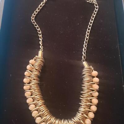 Costume jewelry necklace inc