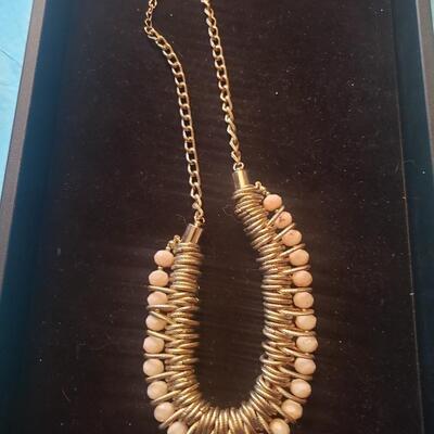 Costume jewelry necklace inc