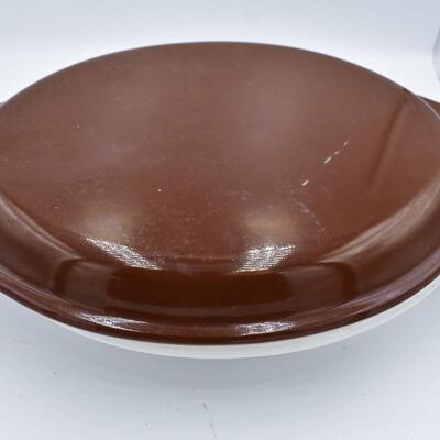 Brown top white bottom casserole dish