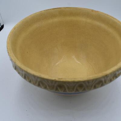 Orangish Clay Round bowl w/ blue and rings