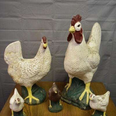 Lawn Rooster, hen and 3 babie chicks