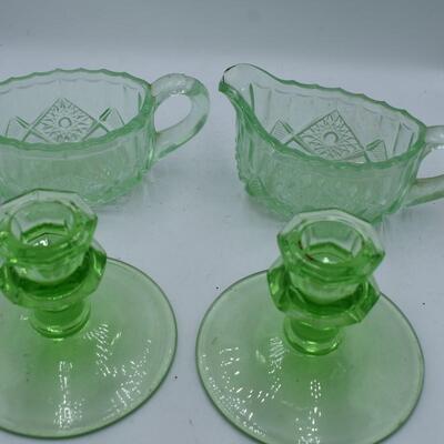 2 lime green candle holders and green cream and sugar