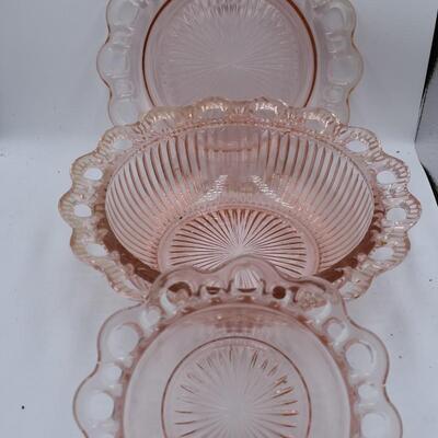 Pink matching glass bowls and plate