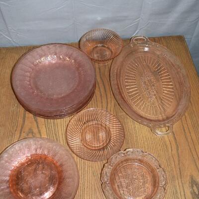 Pink depression glassware, plates, platter and ashtray