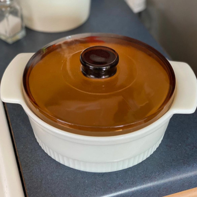 Vintage 1 1/2 qt Fireking Casserole Dish with amber lid. Beautiful condition!