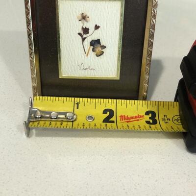 Small photo frame with pressed flower