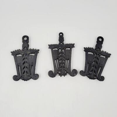 CAST IRON TRIPLE SET OF TRIVETS