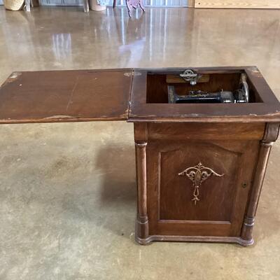 Sewing Machine in cabinet