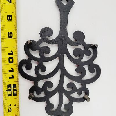 CAST IRON FAMILY TREE VINTAGE TRIVET
