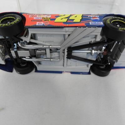 2003 Die Cast Monte Carlo #24 Jeff Gordon Dupont, Size1/24 w/Clear Display Box