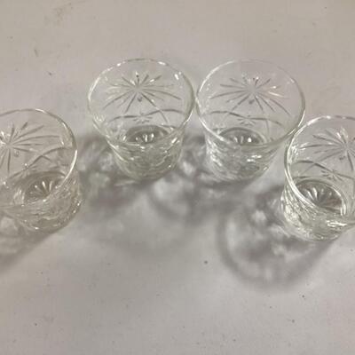 4 small cut glass goblets