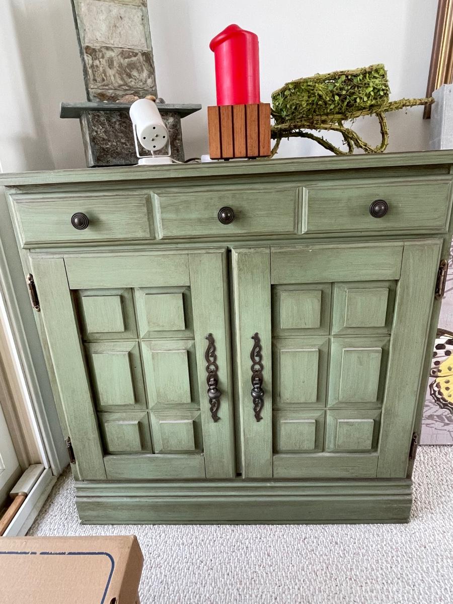 Sage green cabinet | EstateSales.org