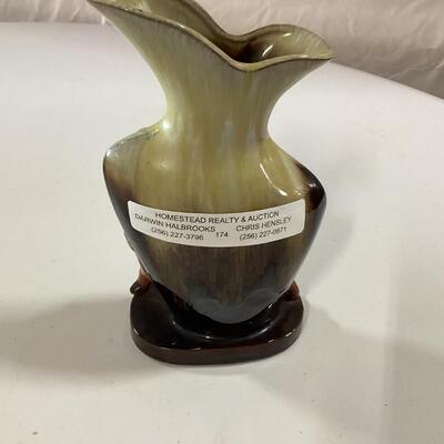 ceramic vase with dogs