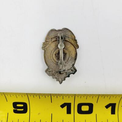 SMALL METAL DEPUTY SHERIFF BADGE