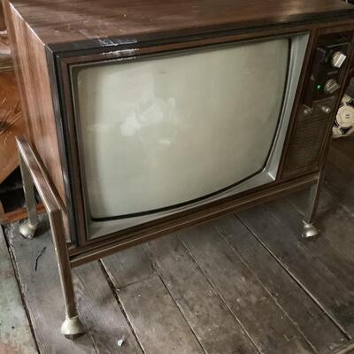 Vintage Quasar TV on cart
