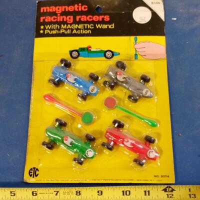 LOT 9   VINTAGE TOY MAGNETIC RACING RACERS