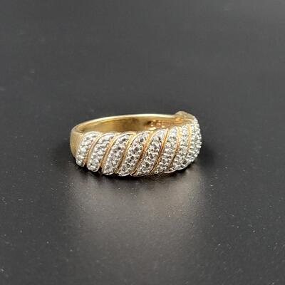 FAUX DIAMOND. 925 GOLD TONED RING SIZE 7.5