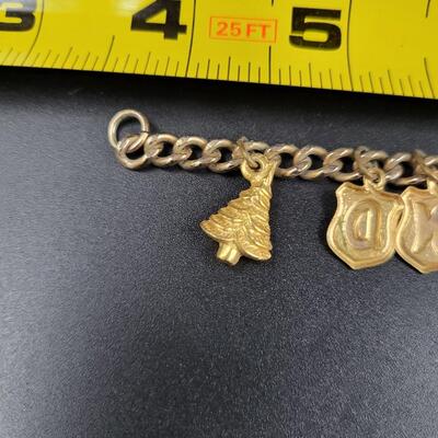 CAMP HAMMOND GOLD TONED CHARM BRACELET