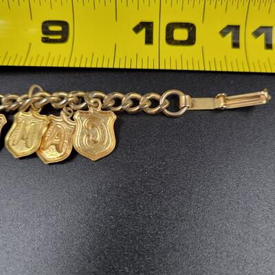 CAMP HAMMOND GOLD TONED CHARM BRACELET