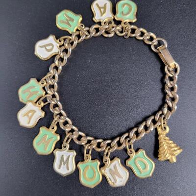 CAMP HAMMOND GOLD TONED CHARM BRACELET