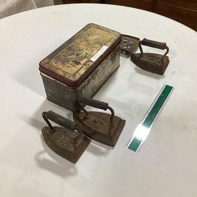 antique irons and bread box