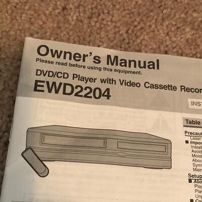 Emerson DVD & VHS Player w/ VHS tapes & DVDs (UR-KM)