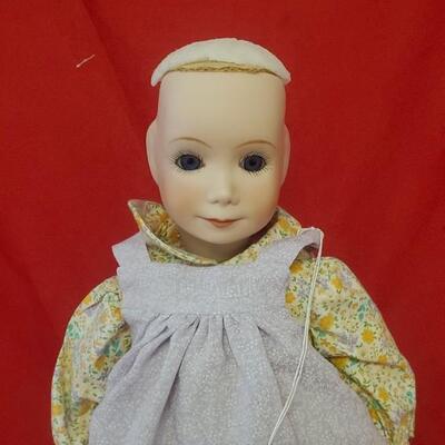 Porcelain Doll With Flower Dress