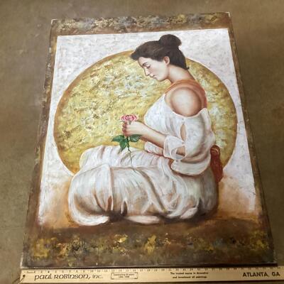 Woman with flower painting on canvas