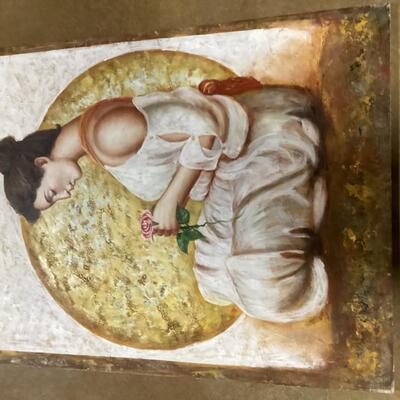 Woman with flower painting on canvas