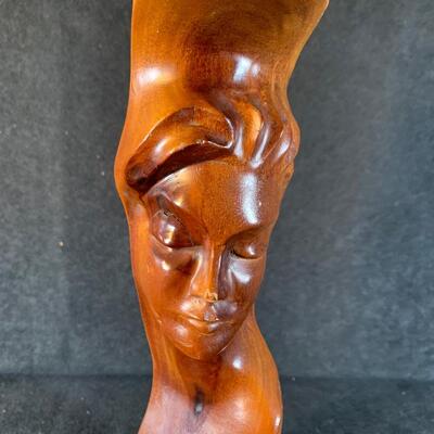 Lot 58. Wood carving and Floral Arrangement