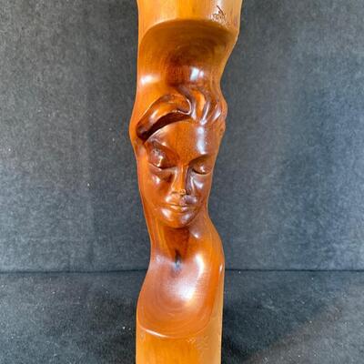 Lot 58. Wood carving and Floral Arrangement