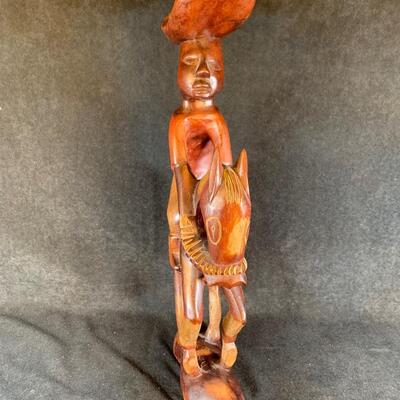 Lot 105. Wood Man on Horse