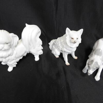 8 Dog Figurines: 1 Chair W/Dogs, 1 Candle Holder, Various Breeds/Colors