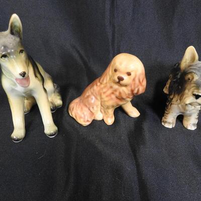 8 Dog Figurines: 1 Chair W/Dogs, 1 Candle Holder, Various Breeds/Colors