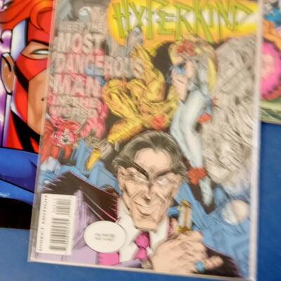 LOT 81   NINE VINTAGE COMIC BOOKS X-MEN AND HYPERKIND