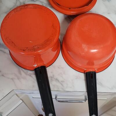 Vintage orange enamel ware