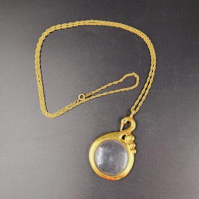 AVON SWAN MAGNIFYING GLASS NECKLACE
