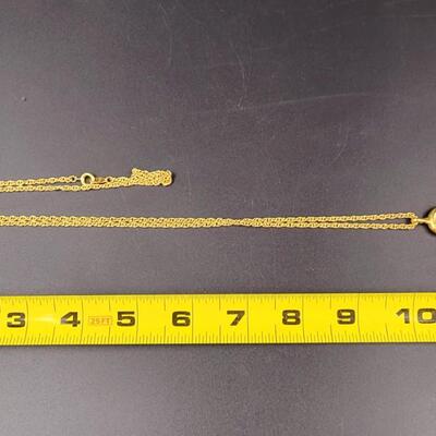 AVON SWAN MAGNIFYING GLASS NECKLACE