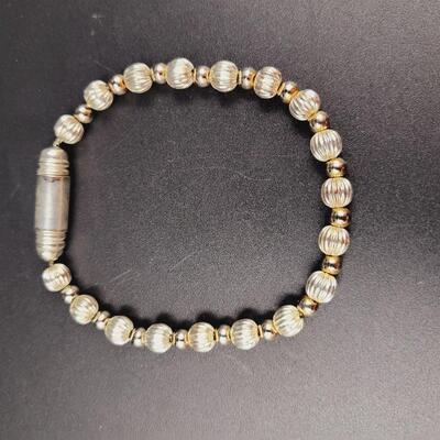 SILVER TONED MAGNETIC BRACELET