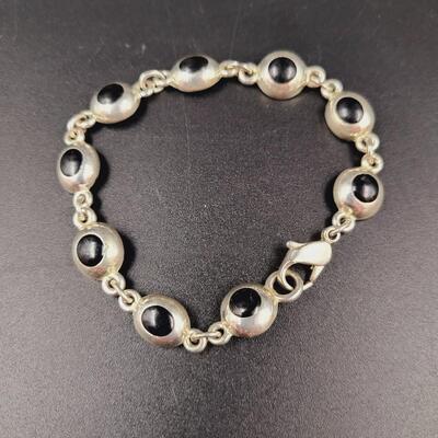 LEI SILVER TONED BLACK DECORATIVE BRACELET