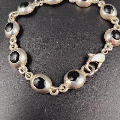 LEI SILVER TONED BLACK DECORATIVE BRACELET